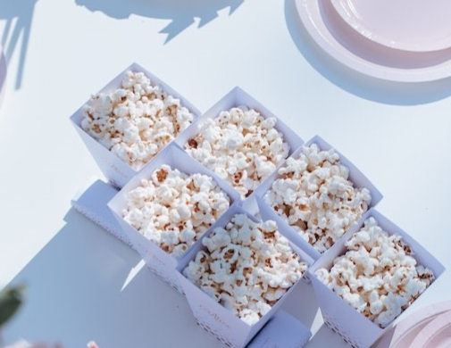 Freshly popped popcorn with Bembie’s Grass-Fed Ghee, a healthy and flavorful snack perfect for Keto and Paleo diets.